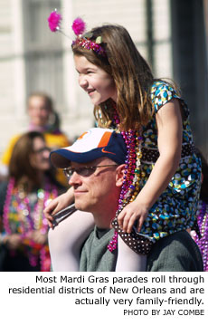 Most Mardi Gras parades roll through residential districts of New Orleans and are actually very family-friendly. Photo by Jay Combe