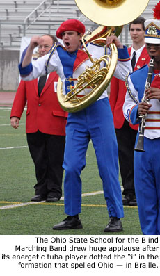 The Ohio State School for the Blind Marching Band drew huge applause after its energetic tuba player dotted the 'i' in the formation that spelled Ohio - in Braille.