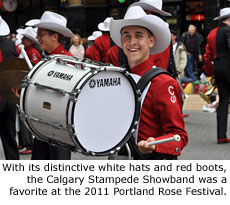 With its distinctive white hats and red boots, the Calgary Stampede Showband was a favorite at the 2011 Portland Rose Festival. Photo by Marching.com