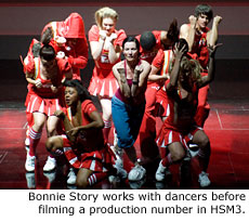 Bonnie Story works with dancers before filming a production number in HSM3.