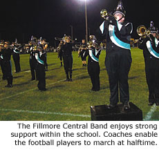 The Fillmore Central Band enjoys strong support within the school. Coaches enable the football players to march at halftime.