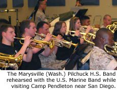 The Marysville (Wash.) Pilchuck H.S. Band rehearsed with the Marine Band while visiting Camp Pendleton near San Diego.